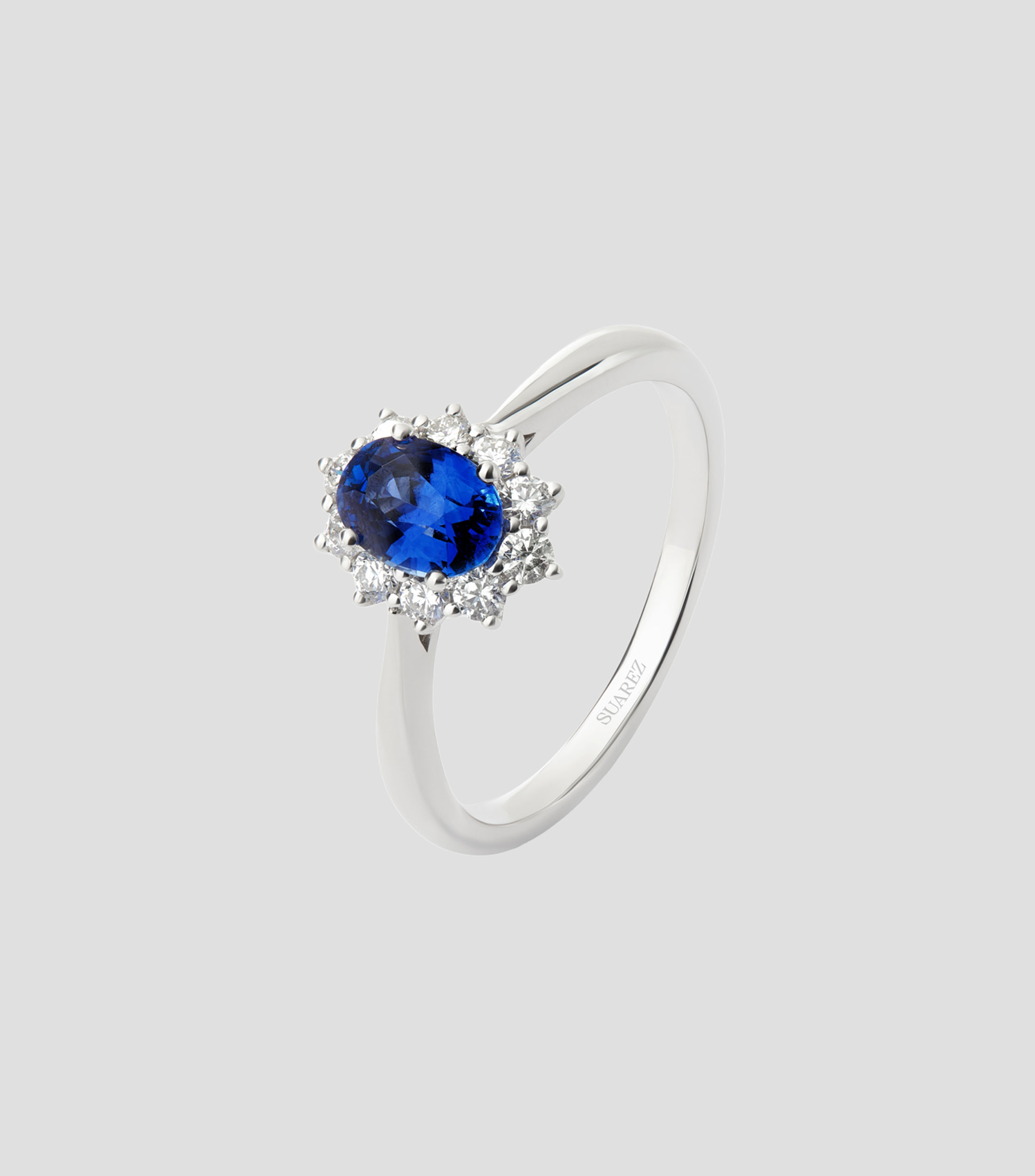 Anillo en Oro blanco de 18 Kilates con zafiro azul Mujer